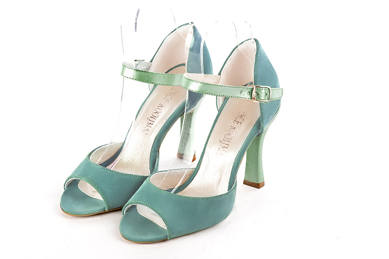 Mint green women's closed back sandals, with an instep strap. Round toe. Very high spool heels. Front view - Florence KOOIJMAN